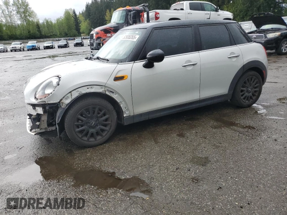 2016 MINI Hardtop 4 Door z VIN WMWXU1C51G2D12553, wystawiony jako Copart lot #52935265 z przebiegiem 57 593 mil mil oraz Szkoda całkowita • Salvage title. Historia ofert i sprzedaży dostępna na DreamBid. Obrazek 1.