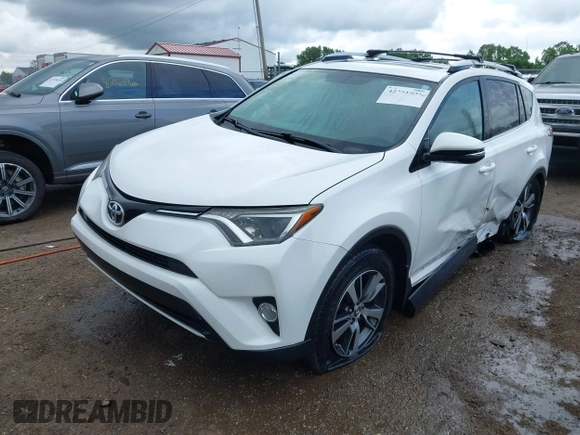 2016 Toyota RAV4 XLE with VIN 2T3RFREV8GW450273, listed as a IAAI auction lot 42281091 with 75,478 mi miles and . Bid and sale history available at DreamBid. Image 17.