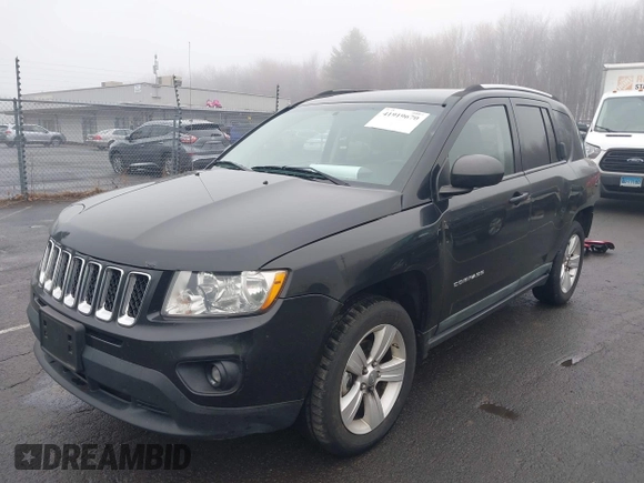 2011 Jeep Compass Latitude with VIN 1J4NF1FBXBD223378, listed as a IAAI auction lot 41919670 with 151,036 mi miles. Bid and sale history available at carsss.com. Image 2.