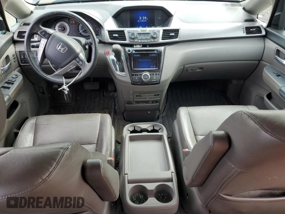 2015 Honda Odyssey Touring Elite with VIN 5FNRL5H95FB117971, listed as a Copart auction lot 52083475 with 82,626 mi miles and Salvage Title. Bid and sale history available at DreamBid. Image 8.