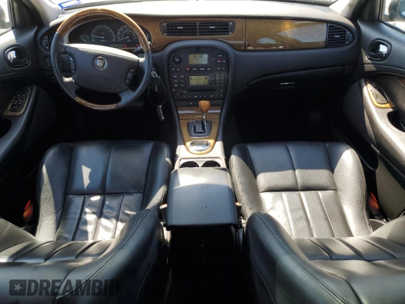 2003 Jaguar S-Type z VIN SAJEA01U73HM89587, wystawiony jako Copart lot #45712745 z przebiegiem 45 916 mil mil oraz Tytuł czysty. Historia ofert i sprzedaży dostępna na DreamBid. Obrazek 8.