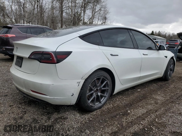 2021 Tesla Model 3 Standard Range Plus z VIN 5YJ3E1EA0MF906162, wystawiony jako Copart lot #53004925 z przebiegiem 149 163 mil mil oraz Tytuł czysty. Historia ofert i sprzedaży dostępna na DreamBid. Obrazek 3.