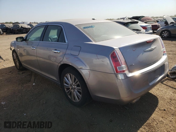 2014 Chrysler 300 C with VIN 2C3CCAKG3EH157999, listed as a Copart auction lot 74798564 with 136,277 mi miles and Salvage Title. Bid and sale history available at carsss.com. Image 2.