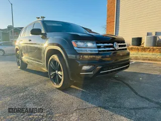2018 Volkswagen Atlas SE z VIN 1V2PR2CA0JC557879, wystawiony jako Copart lot #41911165 z przebiegiem 205 320 mil mil oraz Czysty tytuł • Clean title. Historia ofert i sprzedaży dostępna na DreamBid. Obrazek 1.