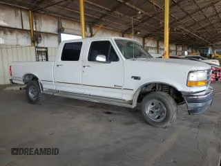 1995 Ford F-150 with VIN 1FTEF14H7SLA53001, listed as a Copart auction lot 82024754 with 133,155 mi miles and Salvage Title. Bid and sale history available at carsss.com. Image 4.
