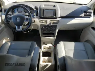 2011 Volkswagen Routan SE with VIN 2V4RW3DG5BR739944, listed as a Copart auction lot 56787495 with 84,932 mi miles and Salvage title. Bid and sale history available at DreamBid. Image 8.