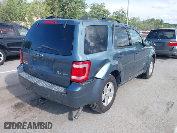 2011 Ford Escape Hybrid z VIN 1FMCU5K37BKB86287, wystawiony jako IAAI lot #42683149 z przebiegiem 151 972 mil mil oraz . Historia ofert i sprzedaży dostępna na DreamBid. Obrazek 4.
