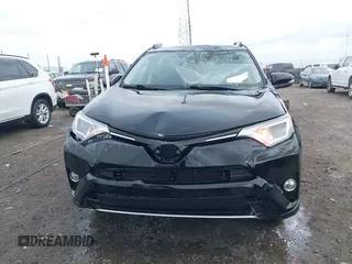 2018 Toyota RAV4 XLE with VIN 2T3WFREV9JW412755, listed as a IAAI auction lot 41889960 with 216,451 mi miles and . Bid and sale history available at carsss.com. Image 12.