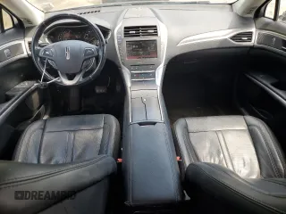 2016 Lincoln MKZ z VIN 3LN6L2J96GR601039, wystawiony jako Copart lot #63209425 z przebiegiem 151 629 mil mil oraz Szkoda całkowita • Salvage title. Historia ofert i sprzedaży dostępna na DreamBid. Obrazek 8.