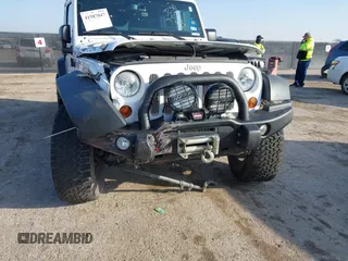 2013 Jeep Wrangler Unlimited Rubicon with VIN 1C4BJWFG0DL529739, listed as a IAAI auction lot 41587047 with 93,116 mi miles. Bid and sale history available at carsss.com. Image 6.