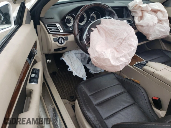 2016 Mercedes-Benz E 400 with VIN WDDKK6FF4GF350570, listed as a Copart auction lot 76563934 with 76,057 mi miles and Salvage Title. Bid and sale history available at carsss.com. Image 9.
