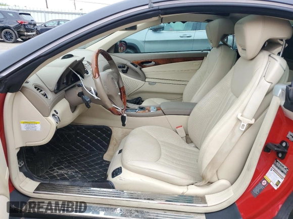 2009 Mercedes-Benz SL 550 с VIN WDBSK71F39F155827, выставлен на аукционе Copart как лот 59483095 с пробегом 74 017 миль миль и Списание • Salvage title. История ставок и продаж доступна на DreamBid. Изображение 7.