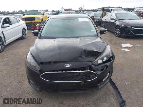 2015 Ford Focus SE with VIN 1FADP3F29FL219561, listed as a IAAI auction lot 42470047 with 98,169 mi miles and . Bid and sale history available at DreamBid. Image 12.