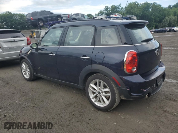 2013 MINI Countryman S ALL4 with VIN WMWZC5C56DWP30689, listed as a Copart auction lot 59680895 with 80,766 mi miles and Salvage title. Bid and sale history available at DreamBid. Image 2.
