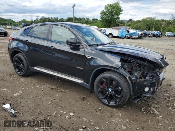 2012 BMW X6 50i z VIN 5UXFG8C51CLZ97393, wystawiony jako Copart lot #58407285 z przebiegiem 128 040 mil mil oraz Szkoda całkowita • Salvage title. Historia ofert i sprzedaży dostępna na DreamBid. Obrazek 4.