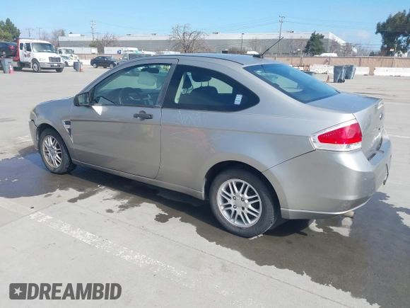 2008 Ford Focus SE with VIN 1FAHP33NX8W135881, listed as a IAAI auction lot 41668949 with 160,261 mi miles. Bid and sale history available at carsss.com. Image 3.