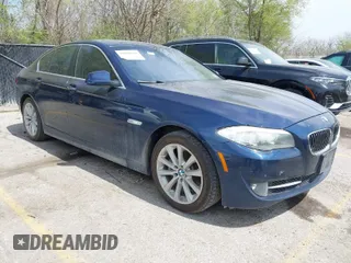2013 BMW 5 Series 528i xDrive with VIN WBAXH5C52DD107297, listed as a IAAI auction lot 42004619 with 182,805 mi miles. Bid and sale history available at carsss.com. Image 1.