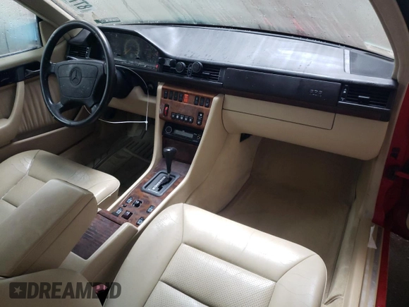 1994 Mercedes-Benz E 320 with VIN WDBEA66E8RC044069, listed as a Copart auction lot 87713565 with 69,061 mi miles and Salvage Title. Bid and sale history available at DreamBid. Image 8.