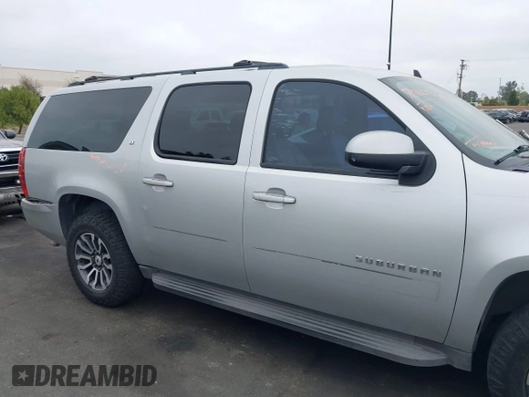 2010 Chevrolet Suburban LT with VIN 1GNUCJE03AR238548, listed as a IAAI auction lot 42104596 with 153,959 mi miles and . Bid and sale history available at DreamBid. Image 13.