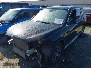 2018 BMW X1 sDrive28i with VIN WBXHU7C39J5L07129, listed as a IAAI auction lot 41472014 with 56,486 mi miles. Bid and sale history available at carsss.com. Image 18.