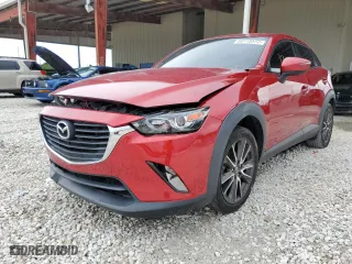 2017 Mazda CX-3 Touring with VIN JM1DKDC73H0163586, listed as a Copart auction lot 59118572 with 47,617 mi miles. Bid and sale history available at carsss.com. Image 2.
