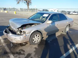 1999 Toyota Camry LE z VIN 4T1BF28K3XU931485, wystawiony jako IAAI lot #41413709 z przebiegiem 148 621 mil mil oraz . Historia ofert i sprzedaży dostępna na DreamBid. Obrazek 17.