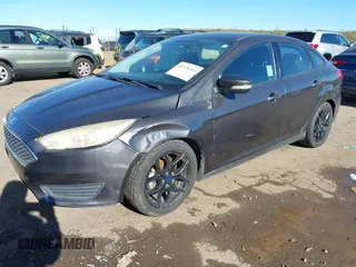 2016 Ford Focus SE z VIN 1FADP3F27GL321507, wystawiony jako IAAI lot #41278203 z przebiegiem 157 910 mil mil oraz . Historia ofert i sprzedaży dostępna na DreamBid. Obrazek 17.