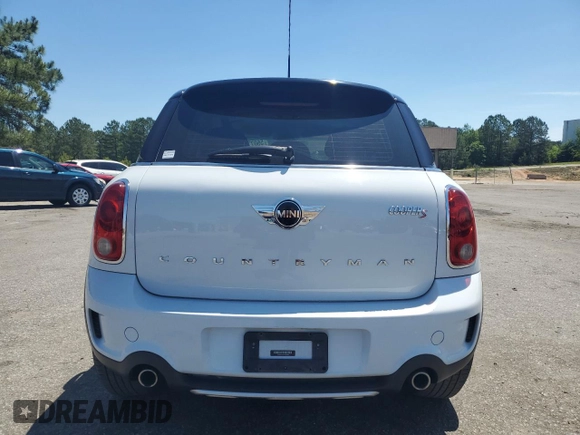 2016 MINI Countryman S with VIN WMWZC5C51GWU00690, listed as a Copart auction lot 55077095 with 104,176 mi miles and Salvage title. Bid and sale history available at DreamBid. Image 6.