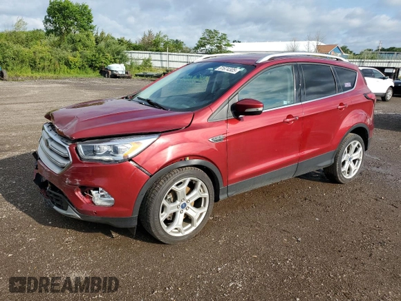 2019 Ford Escape Titanium with VIN 1FMCU0J98KUC00873, listed as a Copart auction lot 61674305 with 53,554 mi miles and Salvage title. Bid and sale history available at DreamBid. Image 1.
