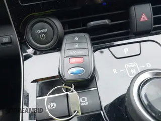 2024 Subaru Solterra Limited z VIN JTMABABA9RA056018, wystawiony jako IAAI lot #41611126 z przebiegiem 15 861 mil mil oraz . Historia ofert i sprzedaży dostępna na DreamBid. Obrazek 11.