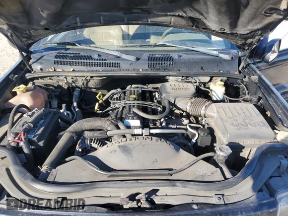 2002 Jeep Grand Cherokee Limited z VIN 1J8GW58SX2C286904, wystawiony jako Copart lot #84749214 z przebiegiem Nie podano mil oraz Czysty tytuł • Clean title. Historia ofert i sprzedaży dostępna na DreamBid. Obrazek 12.