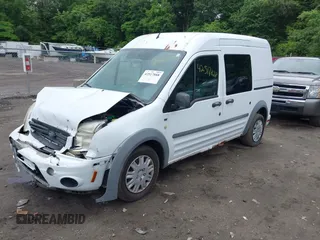 2010 Ford Transit Connect XLT z VIN NM0LS6BN5AT014797, wystawiony jako IAAI lot #42517888 z przebiegiem 163 264 mil mil oraz . Historia ofert i sprzedaży dostępna na DreamBid. Obrazek 2.