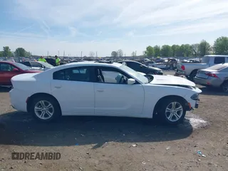 2019 Dodge Charger SXT with VIN 2C3CDXBG7KH661578, listed as a IAAI auction lot 39126917 with 117,594 mi miles. Bid and sale history available at carsss.com. Image 13.
