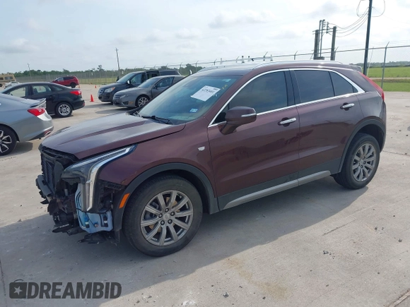 2023 Cadillac XT4 FWD Premium Luxury with VIN 1GYFZCR47PF106017, listed as a IAAI auction lot 42283401 with 40,734 mi miles and . Bid and sale history available at DreamBid. Image 2.