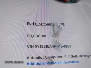 2023 Tesla Model 3 z VIN 5YJ3E1EA4PF454981, wystawiony jako IAAI lot #42704135 z przebiegiem 93 008 mil mil oraz . Historia ofert i sprzedaży dostępna na DreamBid. Obrazek 7.