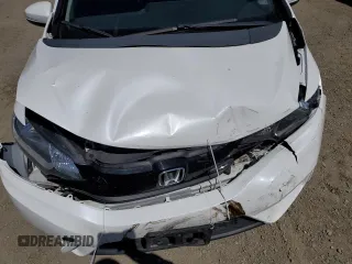 2015 Honda Fit LX with VIN 3HGGK5G55FM748175, listed as a Copart auction lot 56556915 with 98,858 mi miles and Salvage title. Bid and sale history available at DreamBid. Image 11.