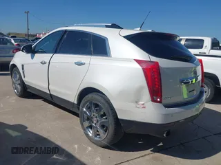 2011 Cadillac SRX Premium Collection z VIN 3GYFNCEYXBS579760, wystawiony jako IAAI lot #42238707 z przebiegiem Nie podano mil oraz . Historia ofert i sprzedaży dostępna na DreamBid. Obrazek 3.