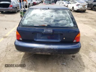1997 Saturn SW z VIN 1G8ZK8279VZ361444, wystawiony jako Copart lot #58929684 z przebiegiem 128 554 mil mil oraz Tytuł czysty. Historia ofert i sprzedaży dostępna na DreamBid. Obrazek 6.