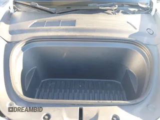 2021 Tesla Model Y Standard Range z VIN 5YJYGDED4MF123311, wystawiony jako IAAI lot #41200519 z przebiegiem 70 190 mil mil oraz . Historia ofert i sprzedaży dostępna na DreamBid. Obrazek 10.