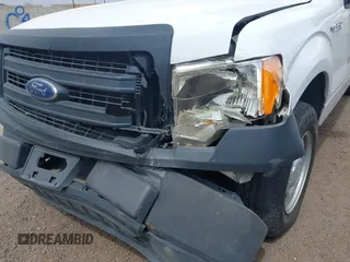 2014 Ford F-150 XL with VIN 1FTMF1CM4EKE98669, listed as a IAAI auction lot 41927986 with 133,246 mi miles and . Bid and sale history available at DreamBid. Image 6.