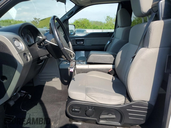 2007 Ford F-150 XLT with VIN 1FTPX14V47FA44659, listed as a Copart auction lot 59054065 with 129,453 mi miles and Salvage title. Bid and sale history available at DreamBid. Image 7.