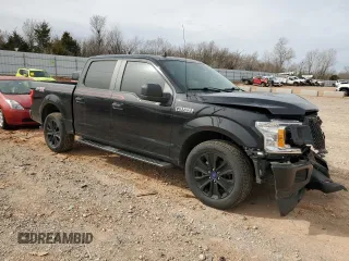 2020 Ford F-150 XL with VIN 1FTEW1CP4LFB46986, listed as a Copart auction lot 48200675 with 59,409 mi miles and Salvage Title. Bid and sale history available at carsss.com. Image 4.