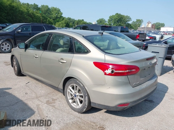 2016 Ford Focus SE z VIN 1FADP3F29GL361006, wystawiony jako IAAI lot #42387418 z przebiegiem 132 806 mil mil oraz . Historia ofert i sprzedaży dostępna na DreamBid. Obrazek 3.