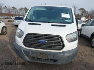 2016 Ford Transit Cargo with VIN 1FTYE9ZM8GKB22179, listed as a IAAI auction lot 41293587 with 105,232 mi miles and . Bid and sale history available at carsss.com. Image 12.
