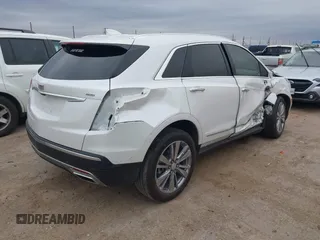 2024 Cadillac XT5 Premium Luxury AWD with VIN 1GYKNERSXRZ707816, listed as a IAAI auction lot 41749596 with 8,701 mi miles. Bid and sale history available at carsss.com. Image 4.
