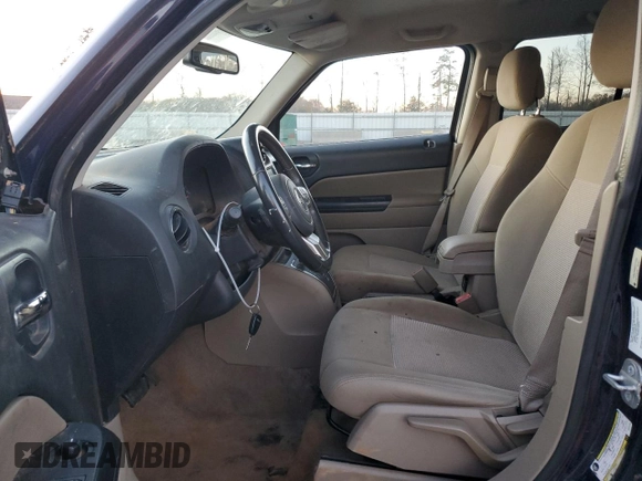 2014 Jeep Patriot Latitude with VIN 1C4NJPFBXED771229, listed as a Copart auction lot 84283034 with 136,340 mi miles and Non Repairable. Bid and sale history available at carsss.com. Image 7.