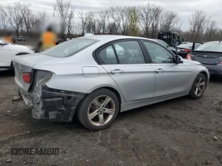 2014 BMW 3 Series 328i xDrive with VIN WBA3B5G53ENS06927, listed as a Copart auction lot 52871955 with 178,753 mi miles and Salvage Title. Bid and sale history available at DreamBid. Image 3.