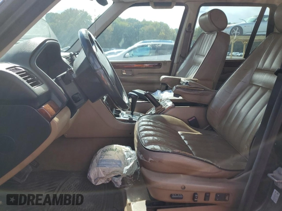 2001 Land Rover Range Rover z VIN SALPM16461A455877, wystawiony jako Copart lot #73062514 z przebiegiem Nie podano mil oraz Czysty tytuł • Clean title. Historia ofert i sprzedaży dostępna na DreamBid. Obrazek 7.