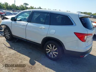 2021 Honda Pilot EX-L with VIN 5FNYF5H53MB006638, listed as a IAAI auction lot 41994463 with 101,786 mi miles. Bid and sale history available at carsss.com. Image 3.