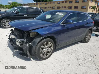 2018 BMW X2 sDrive28i with VIN WBXYJ3C3XJEJ89870, listed as a Copart auction lot 60034795 with 54,064 mi miles and Salvage title. Bid and sale history available at DreamBid. Image 1.